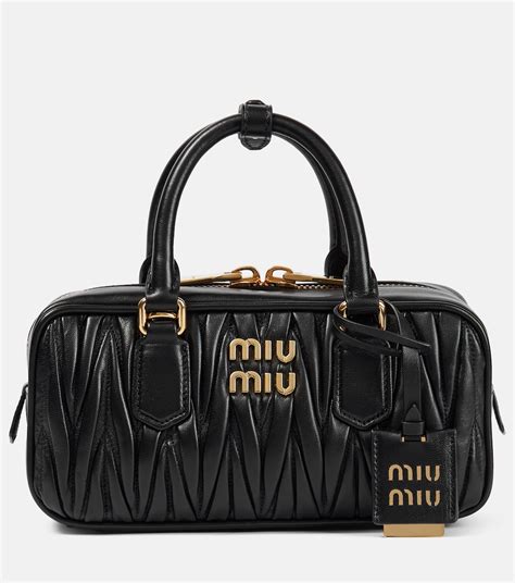 miu miu black studded clutch|miumiu bags for women.